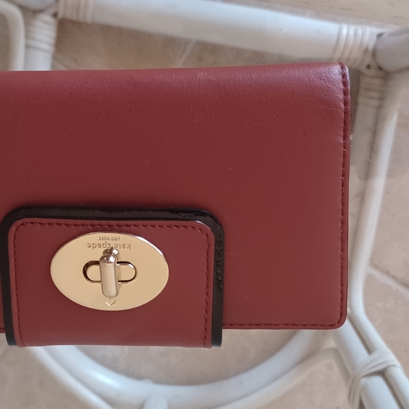 Kate Spade Brown leather turn lock wallet with wrist handle . Approx 7 5 inches - Picture 7 of 12